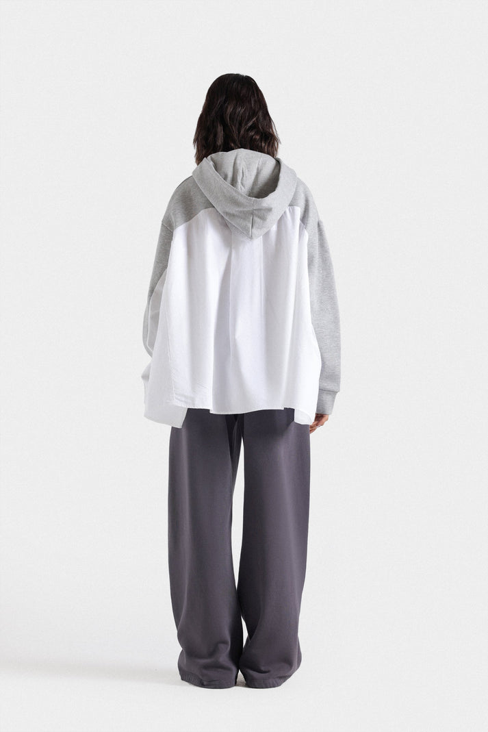 Hoodie with woven fabric