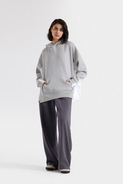 Hoodie with woven fabric